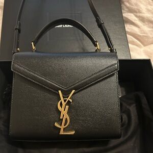YSL CASSANDRA MINI TOP HANDLE BAG IN GRAIN DE POUDRE EMBOSSED LEATHER